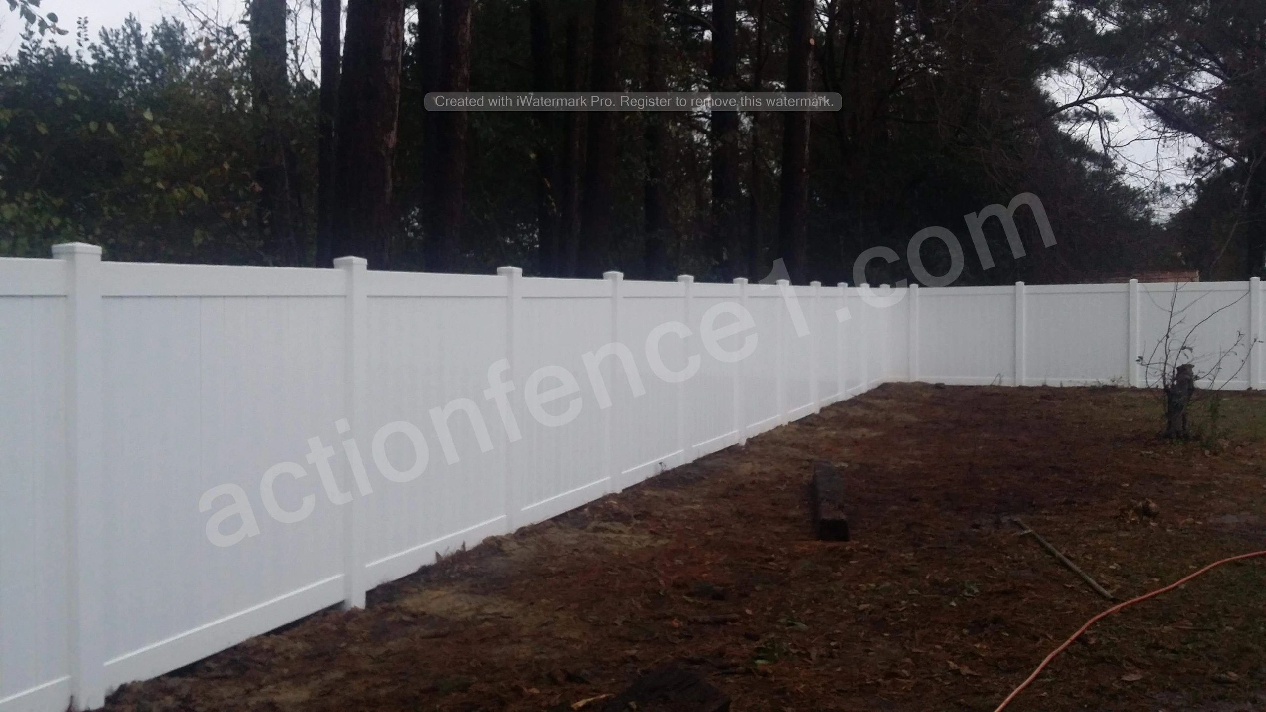 White vinyl fence by AA Action Fence