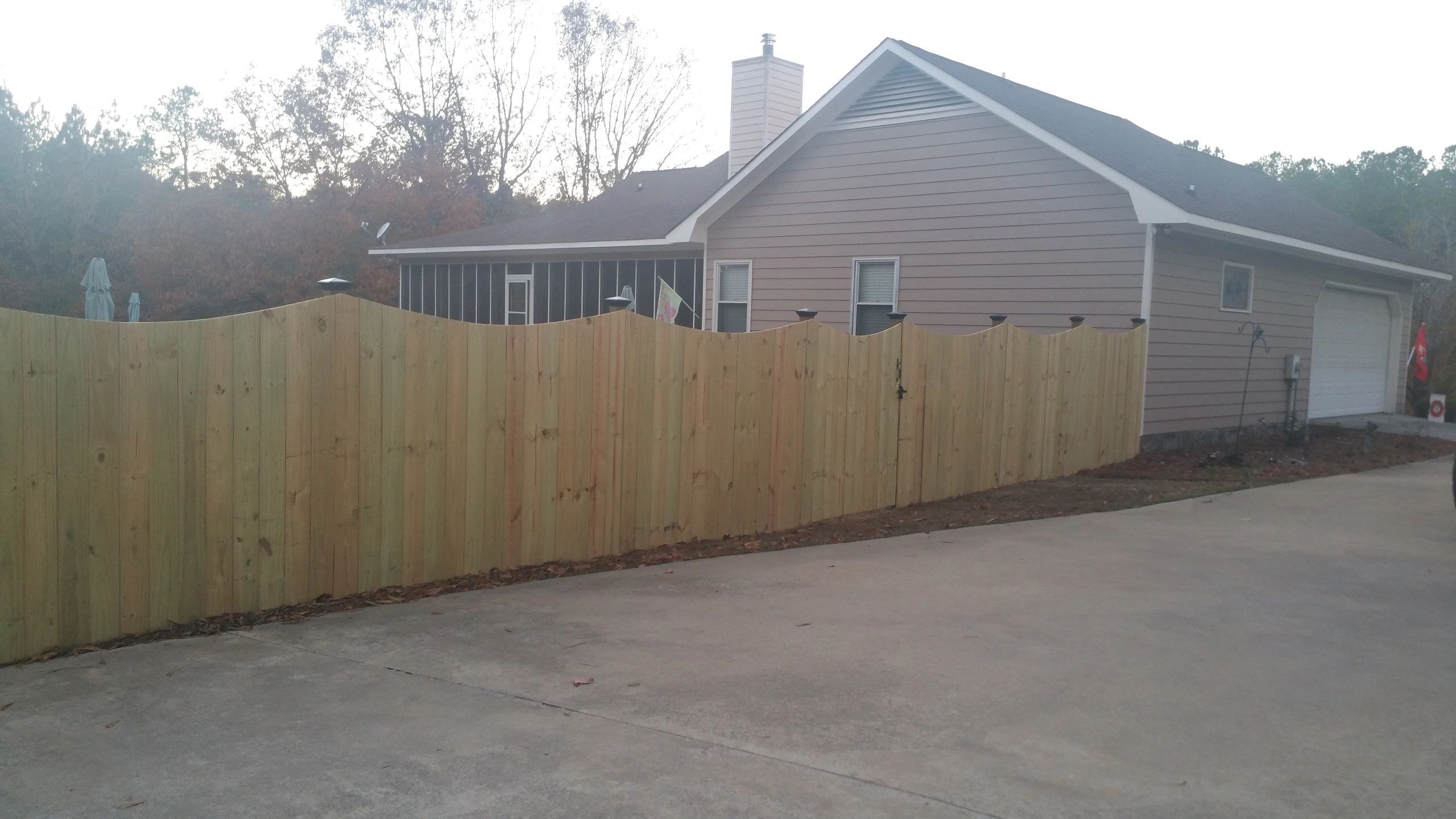 Wood boundary fence by AA Action Fence